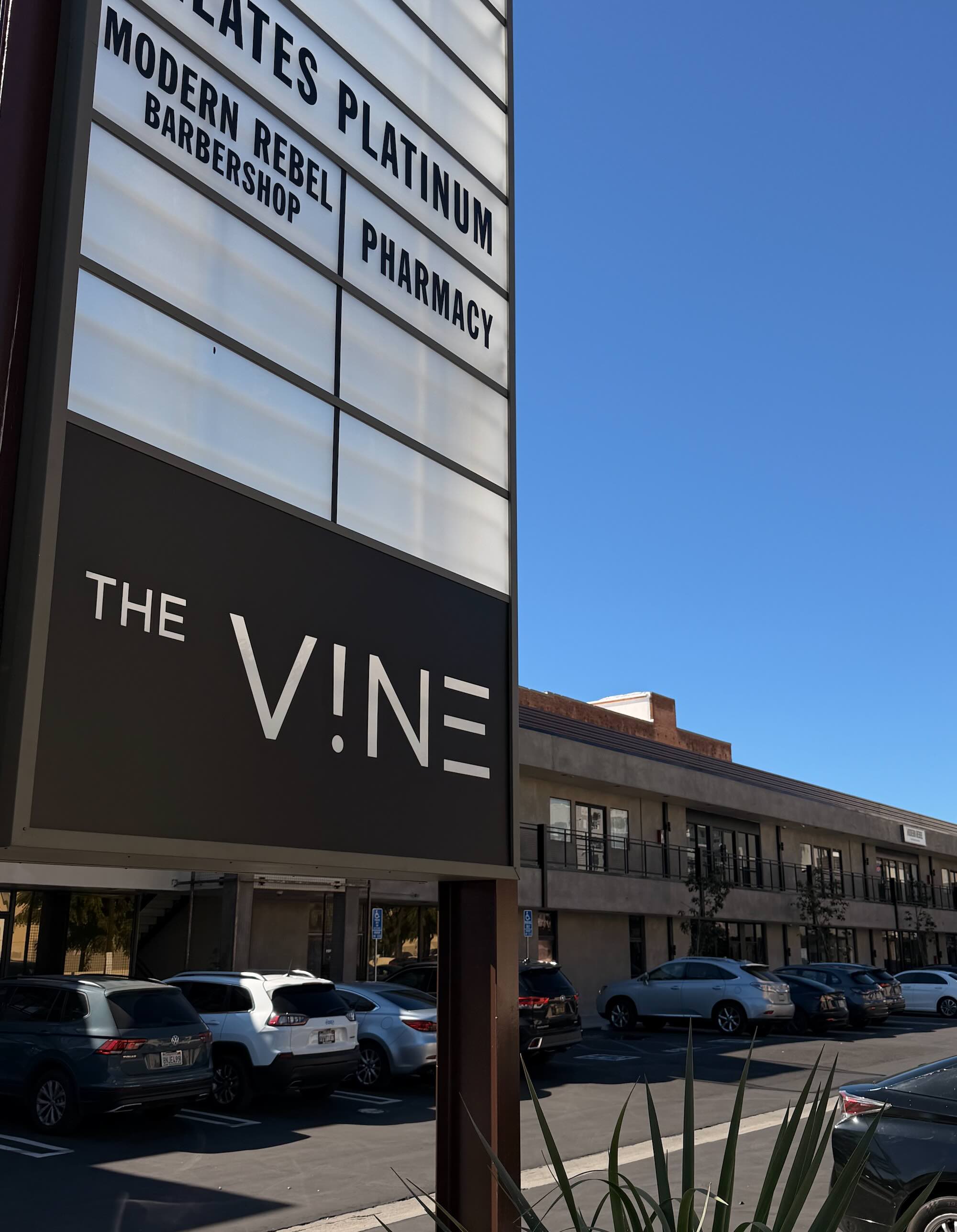 Modern Rebel Barbershop at The Vine shopping center monument sign
