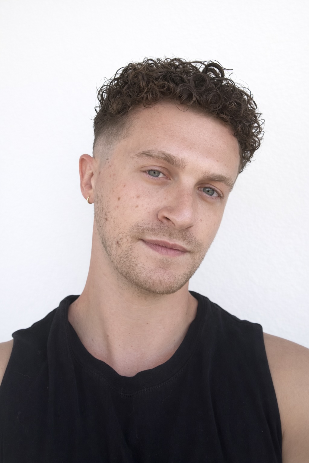 Textured top with fade by Trevor at Modern Rebel Barbershop in West Hollywood